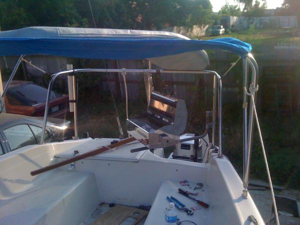 Working on grill install. Ended up with a shorter mount, and mounted lower. I can sit in the cockpit in the shade and cook lunch! It swings aft out of the way when not in use, and stows under the V berth when not on the water.