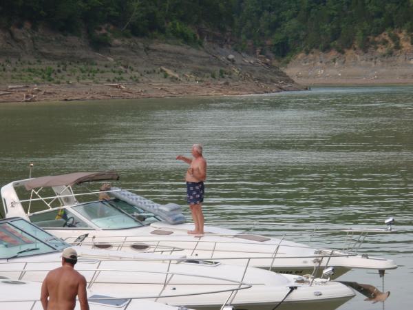 Yep, Dad dancing on his Sea Ray 300, waiting on me